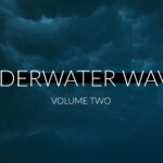 Underwater Waves Volume Two with flowing ocean water and fish schools in motion.