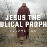 Jesus the Biblical Prophet cinematic footage showing figure in traditional biblical robe and sandals sitting in barren wilderness landscape with bare trees